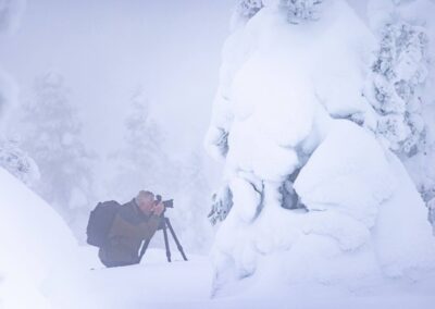 Fotograaf in winterwonderland Finland